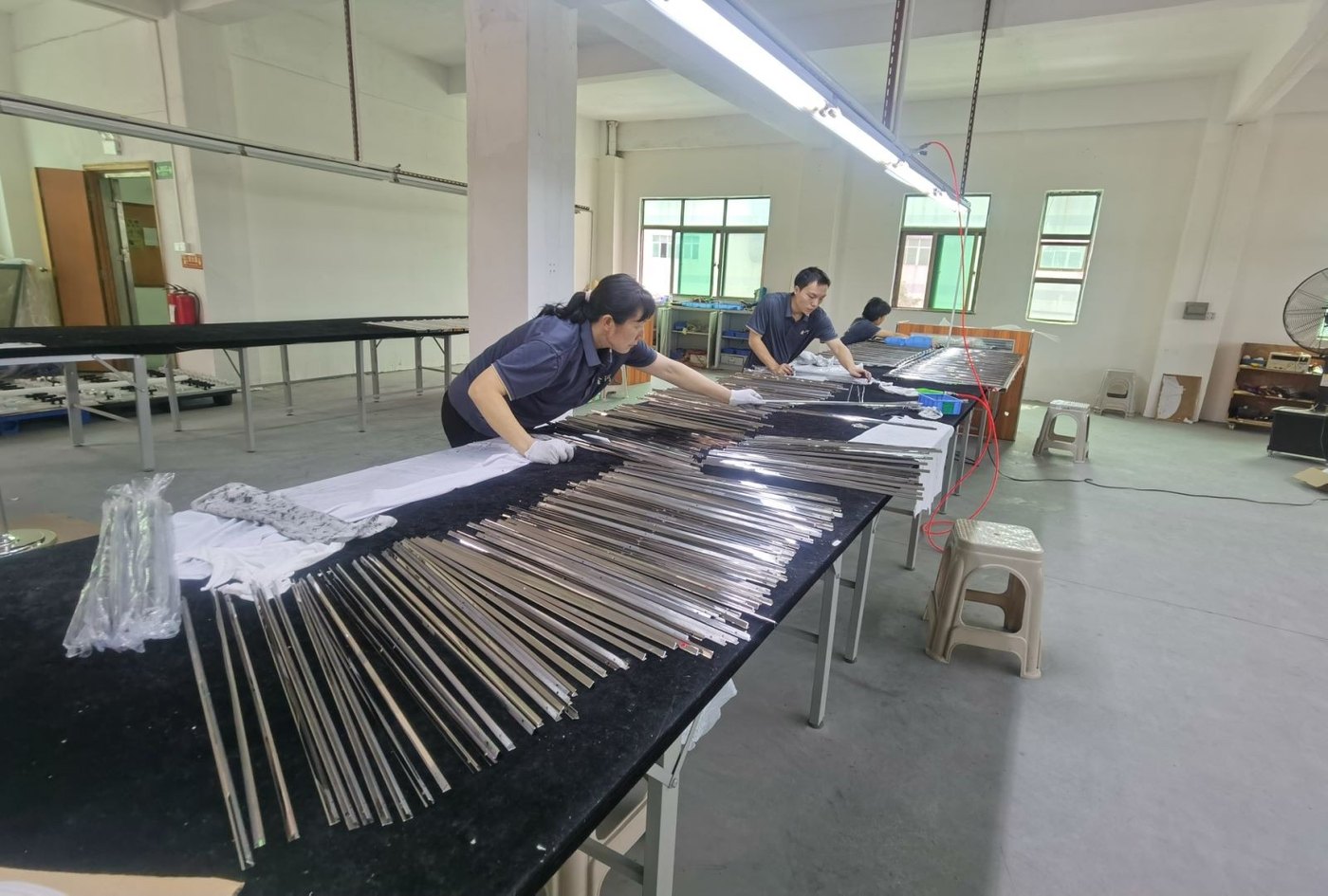 QC bench — checking a finished fixture before packing