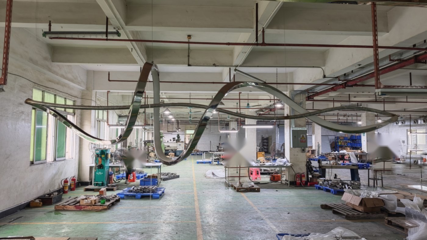 Ribbon chandelier installed in the workshop